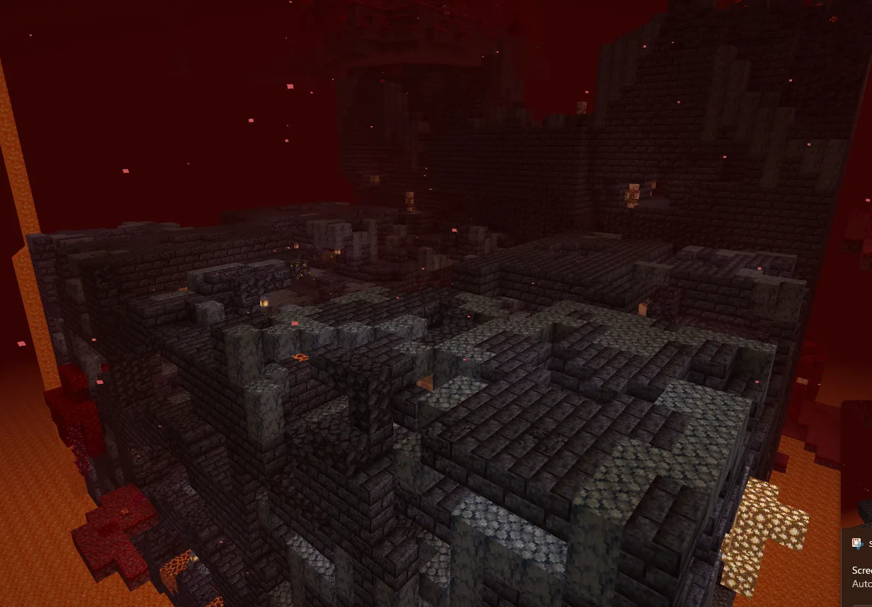 Bastion remnant structure in the Minecraft nether with piglins guarding gold blocks