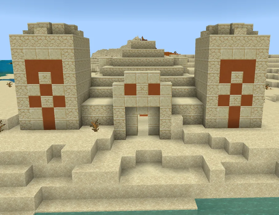 A Minecraft desert pyramid built from sandstone in a wide desert biome