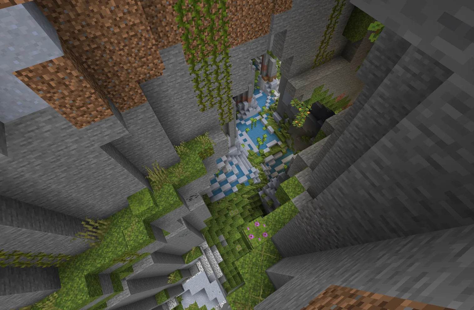 View into a Minecraft lush cave through a natural ravine opening in the surface