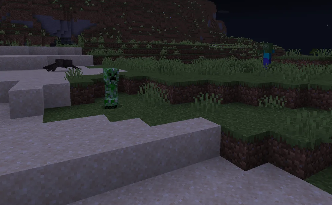 A Minecraft night scene showing a creeper, spider and zombie spawned in an unlit outdoor area